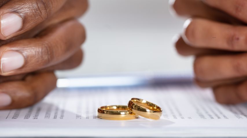 Asset Tracing - Couple hands on divorce agreement